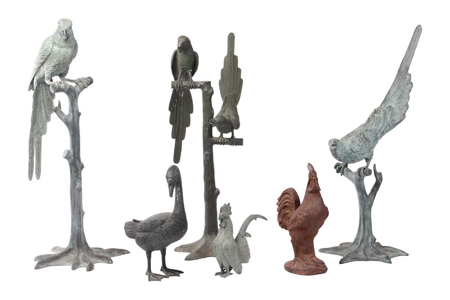 Lot 63 - A set of three decorative green patinated...