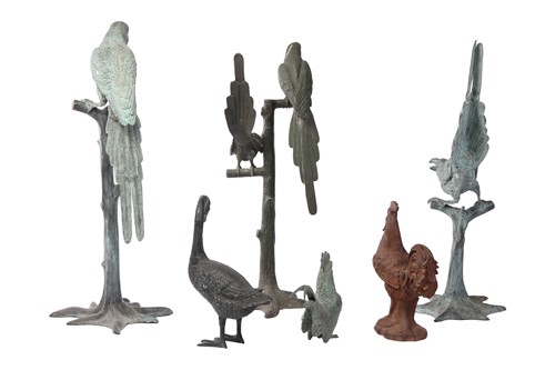 Lot 63 - A set of three decorative green patinated...