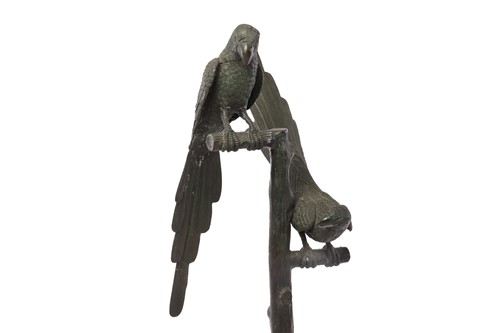 Lot 63 - A set of three decorative green patinated...