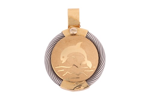Lot 91 - A two-toned pendant, depicting a dolphin...