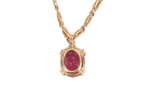 Lot 114 - A tourmaline and diamond pendant and chain,...