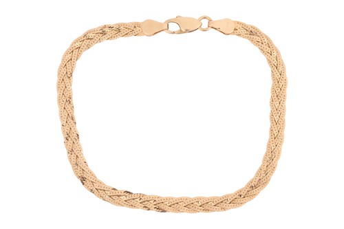 Lot 139 - A bracelet of braided design, featuring four...