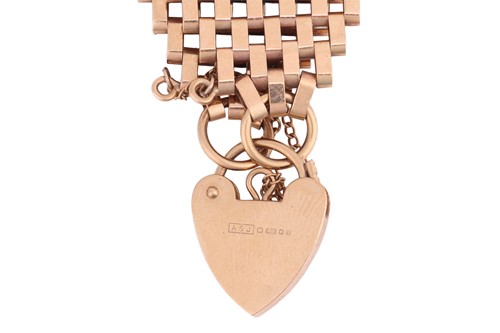 Lot 7 - A wide 9ct gold gate bracelet, with heart...