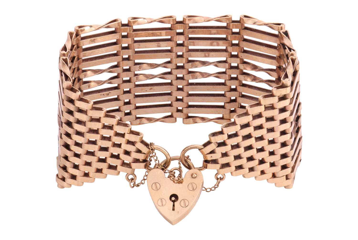 Lot 7 - A wide 9ct gold gate bracelet, with heart...