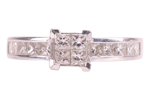 Lot 132 - An illusion-set diamond ring, set with four...