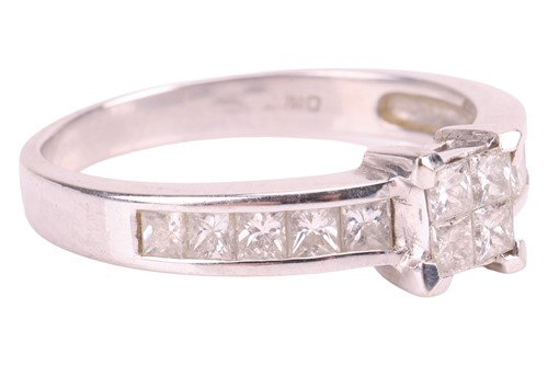 Lot 132 - An illusion-set diamond ring, set with four...