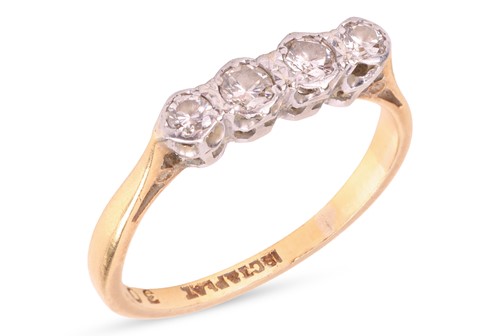 Lot 58 - A diamond four-stone ring, featuring four...