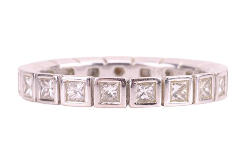 Lot 129 - A diamond eternity ring, comprising nineteen...