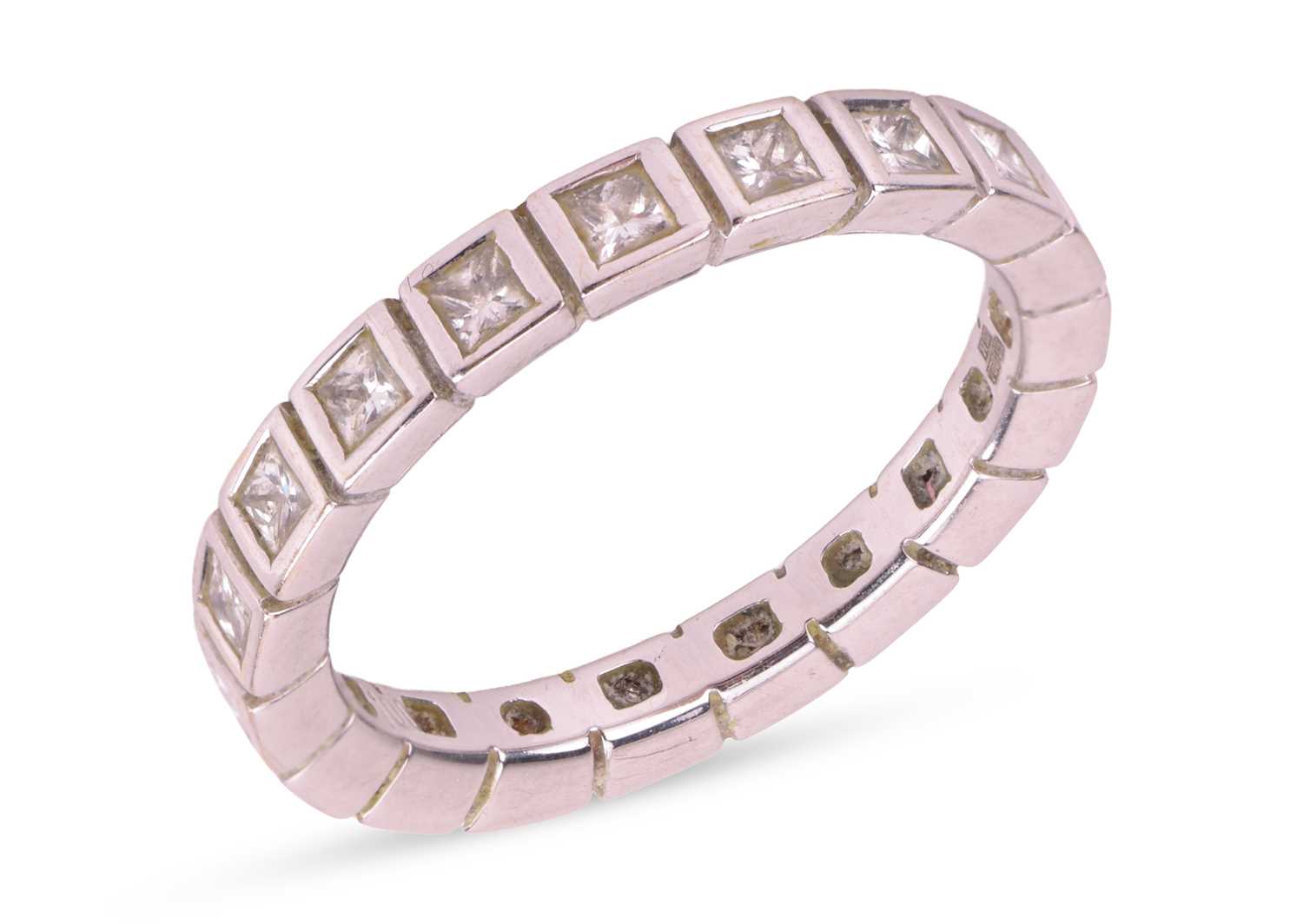 Lot 129 - A diamond eternity ring, comprising nineteen...