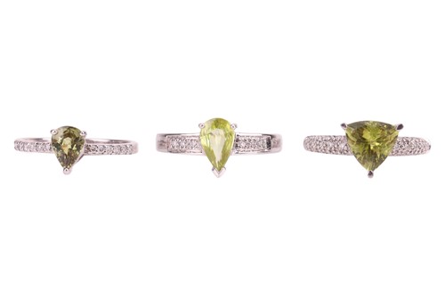 Lot 100 - Three gem-set rings; one set with a...