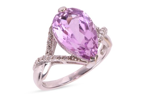 Lot 162 - A kunzite and diamond cocktail ring, featuring...