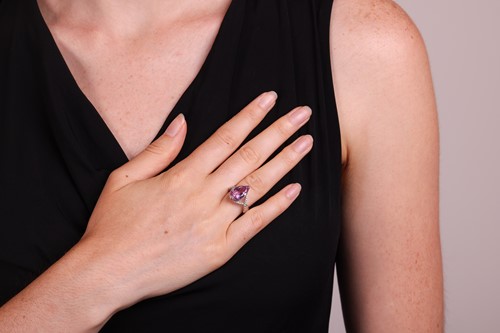 Lot 162 - A kunzite and diamond cocktail ring, featuring...