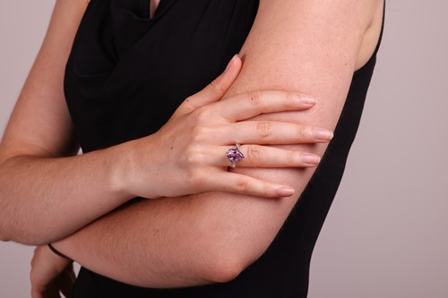 Lot 162 - A kunzite and diamond cocktail ring, featuring...