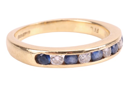 Lot 138 - A sapphire and diamond half eternity ring,...