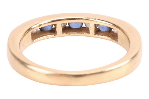 Lot 138 - A sapphire and diamond half eternity ring,...