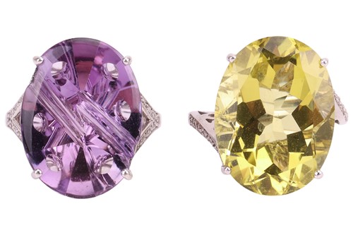 Lot 61 - Two gem-set rings; The first claw-set with a...