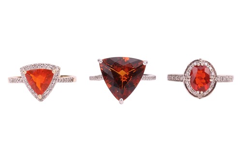 Lot 63 - Three gem-set rings; to include two examples...