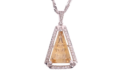 Lot 46 - A citrine and diamond pendant on chain, the...