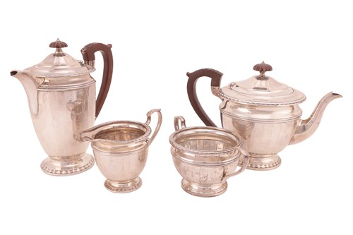 Lot 255 - A four-piece silver tea service, by Barker...