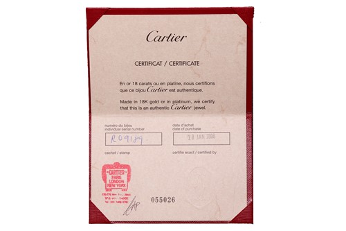 Lot 179 - Cartier - An 18ct gold diamond-set cross...