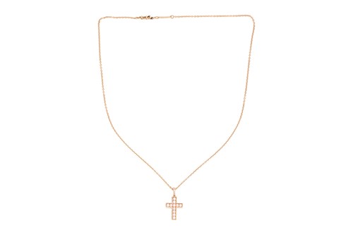 Lot 179 - Cartier - An 18ct gold diamond-set cross...