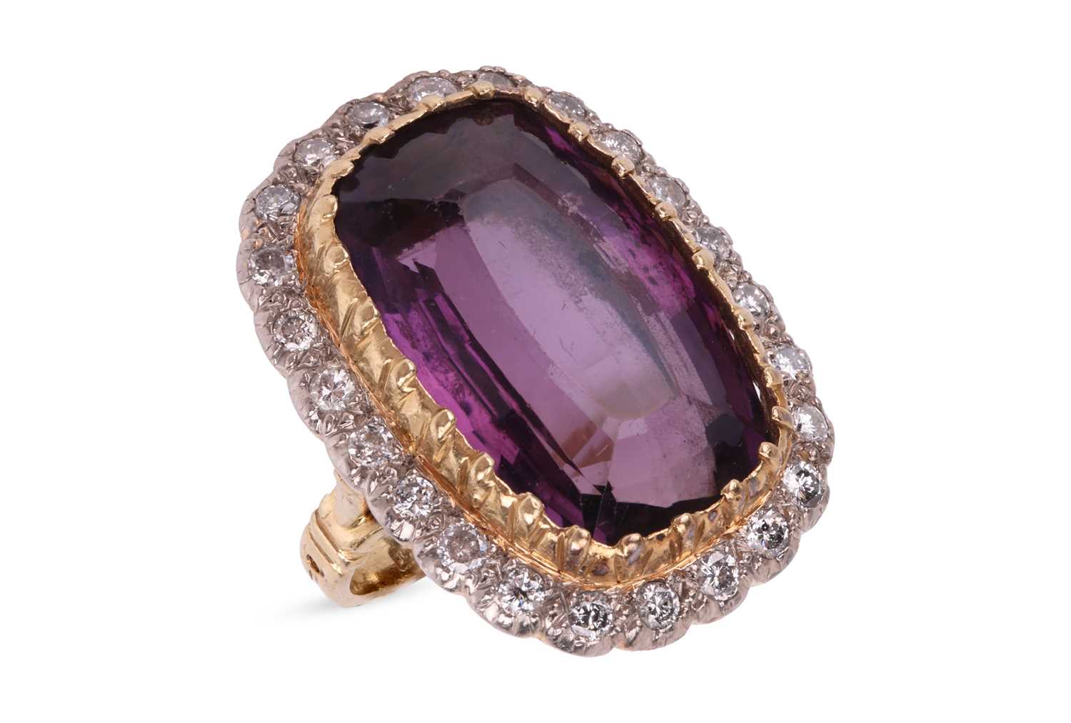 Lot 91 - An amethyst and diamond cocktail ring,...