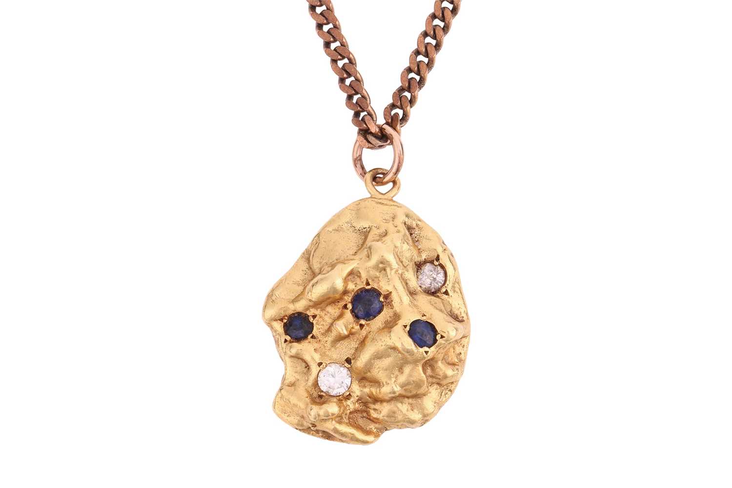 Lot 72 - A sapphire and diamond-set nugget pendant, of...