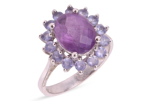 Lot 156 - An amethyst and tanzanite cluster ring, with a...