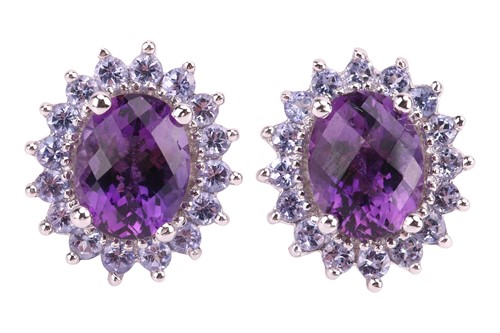 Lot 157 - A pair of amethyst and tanzanite cluster...