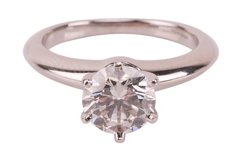 Lot 170 - Tiffany & Co. - A diamond solitaire ring,...