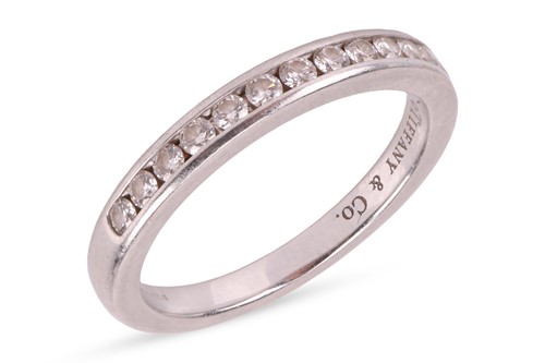 Lot 171 - Tiffany & Co - A diamond-set half-eternity...