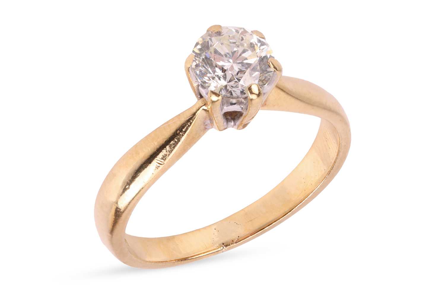 Lot 117 - A diamond solitaire ring, featuring a claw-set...
