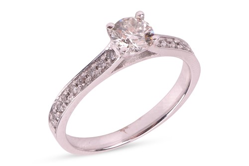Lot 165 - A diamond solitaire ring, featuring a claw-set...