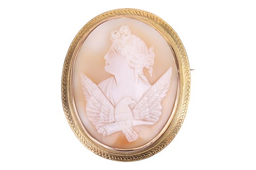 Lot 18 - A shell cameo brooch, depicting a classical...