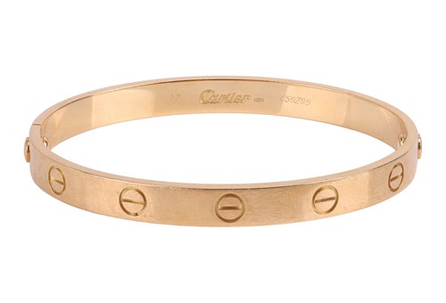 Lot 180 - Cartier - A 'LOVE' bangle, composed of two...