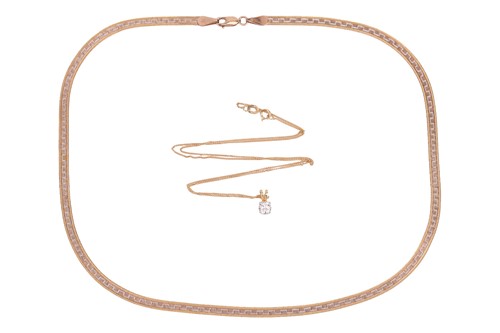 Lot 16 - Two necklaces; The first a diamond solitaire...