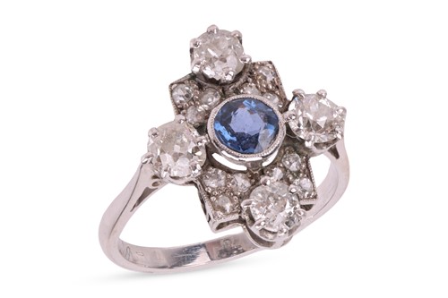 Lot 49 - A sapphire & diamond cluster ring, featuring a...