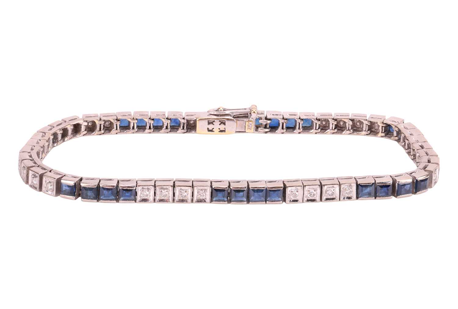 Lot 52 - A sapphire & diamond line bracelet, comprising...