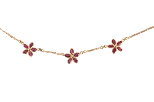 Lot 116 - A ruby necklace of folaite design, featuring...