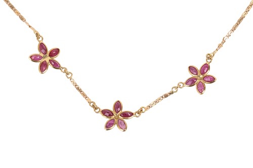 Lot 116 - A ruby necklace of folaite design, featuring...
