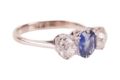 Lot 47 - A sapphire and diamond trilogy ring,...