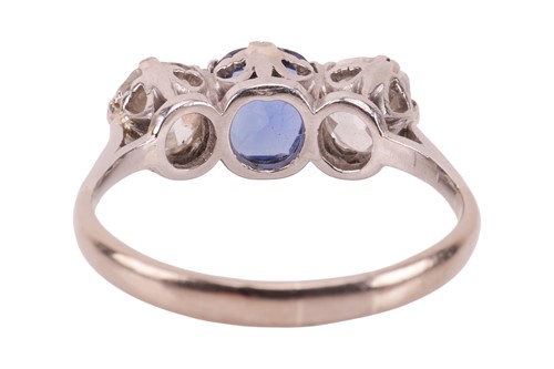 Lot 47 - A sapphire and diamond trilogy ring,...