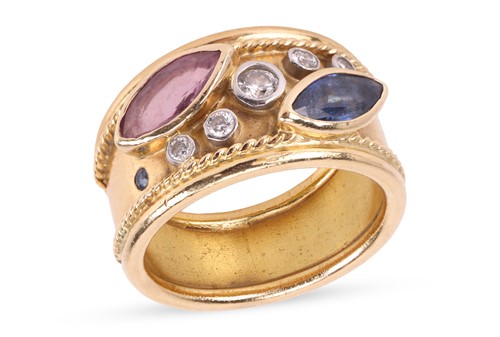Lot 94 - A ruby, sapphire and diamond ring, comprising...