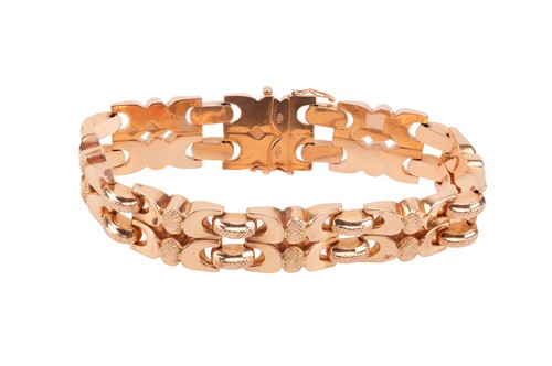 Lot 63 - A Mid-Century link bracelet, comprising two...