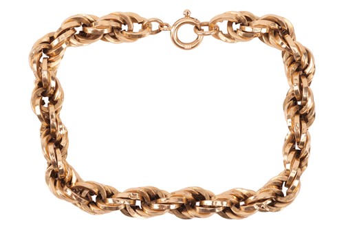 Lot 77 - A twisted rope link bracelet, comprising a...
