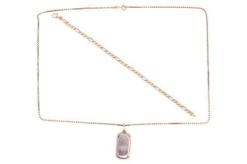 Lot 36 - A two-toned pendant on chain, together with a...