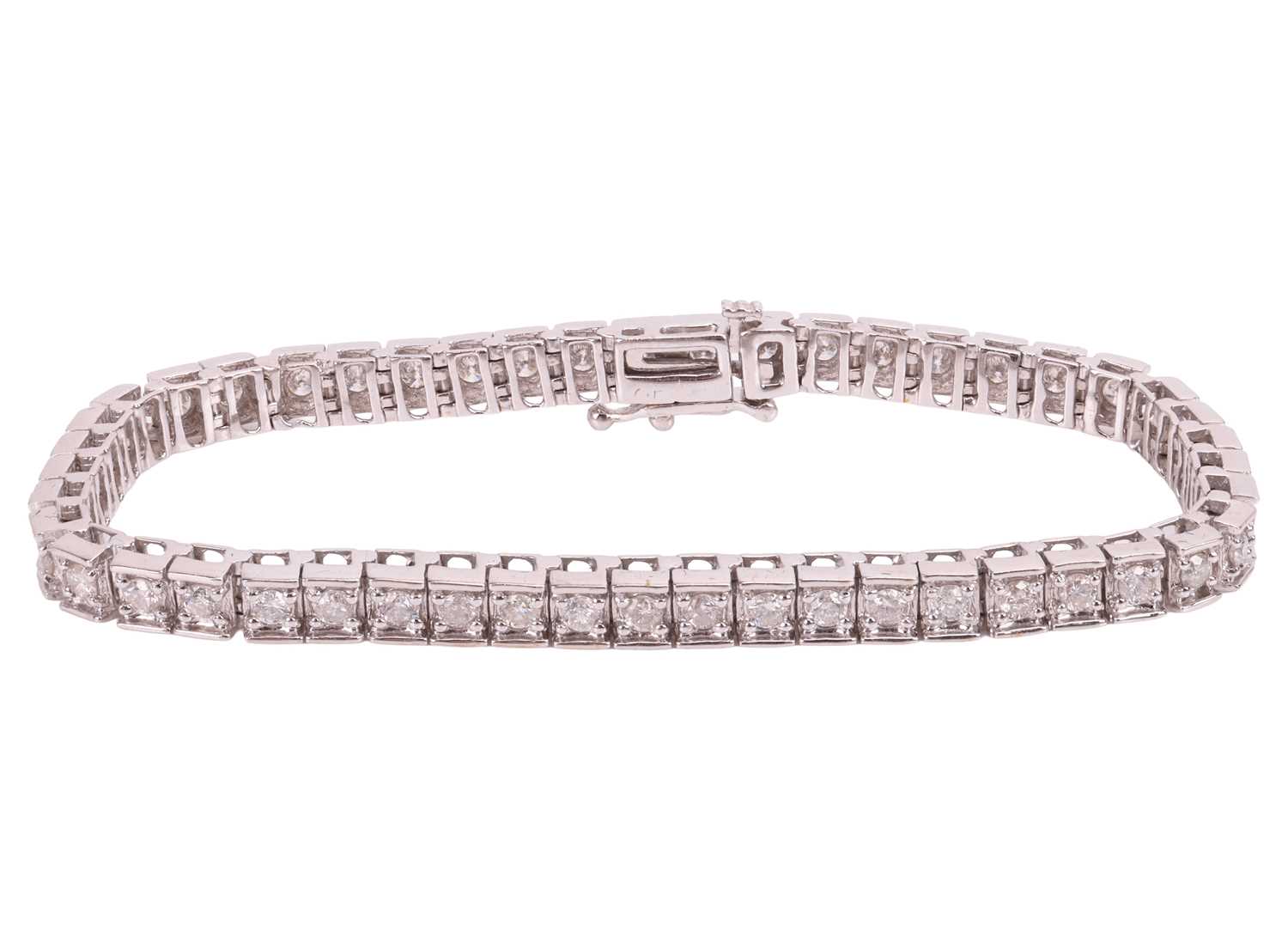 Lot 178 - A diamond line bracelet, featuring forty-eight...