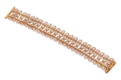 Lot 106 - A cultured pearl bracelet, featuring four rows...