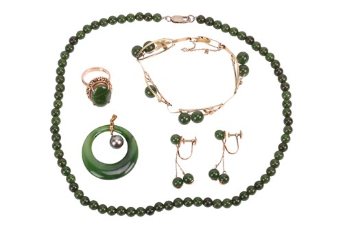 Lot 46 - A collection of nephrite jade jewellery; to...