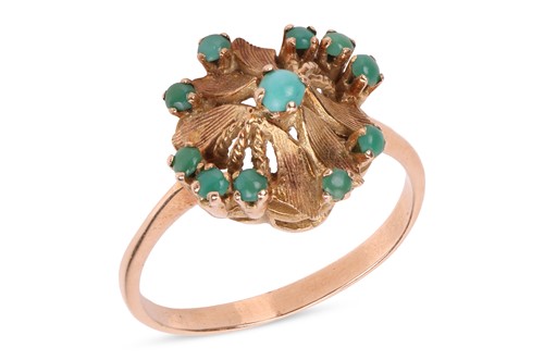 Lot 74 - A turquoise-set dress ring, featuring a...